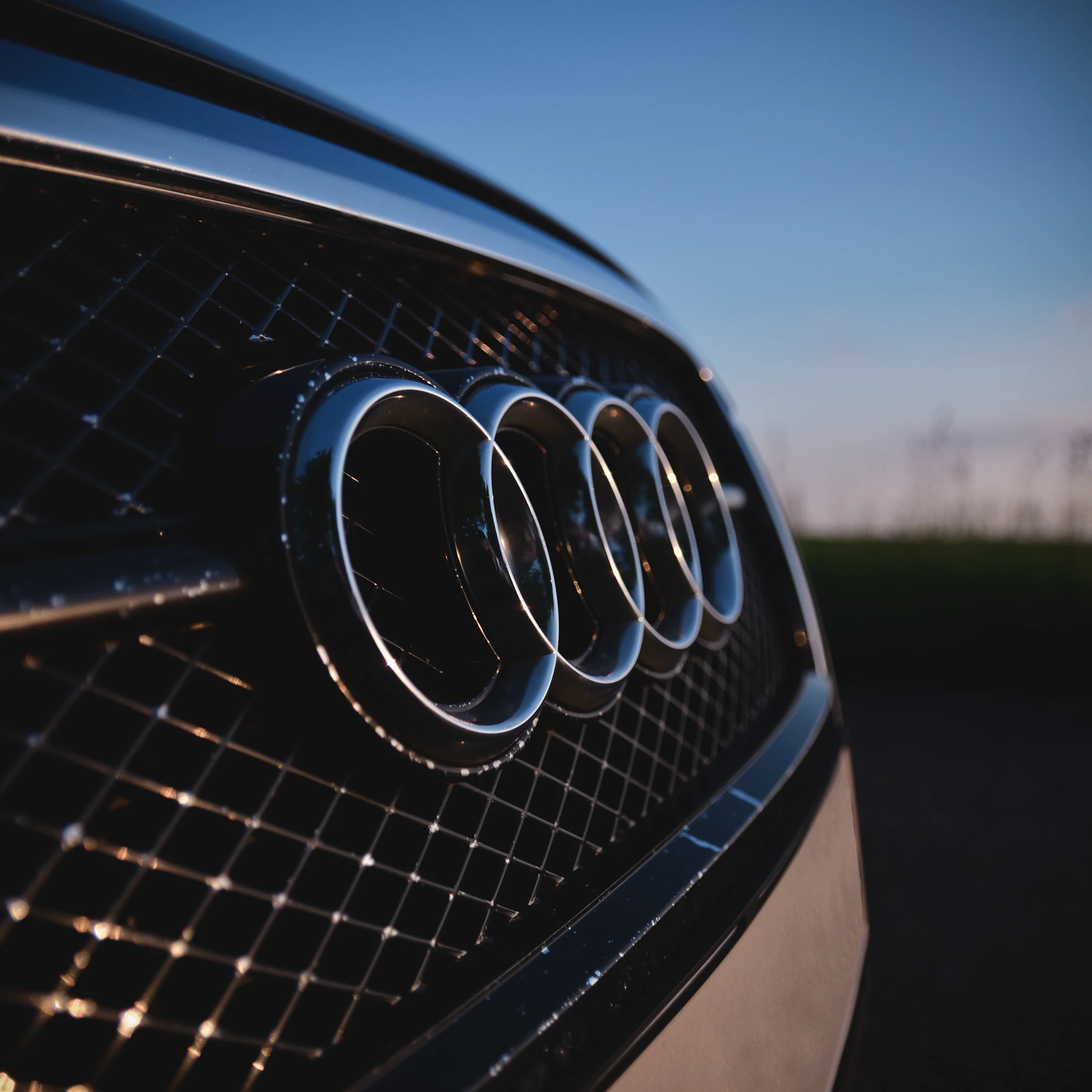 a close up of the front grille of a car