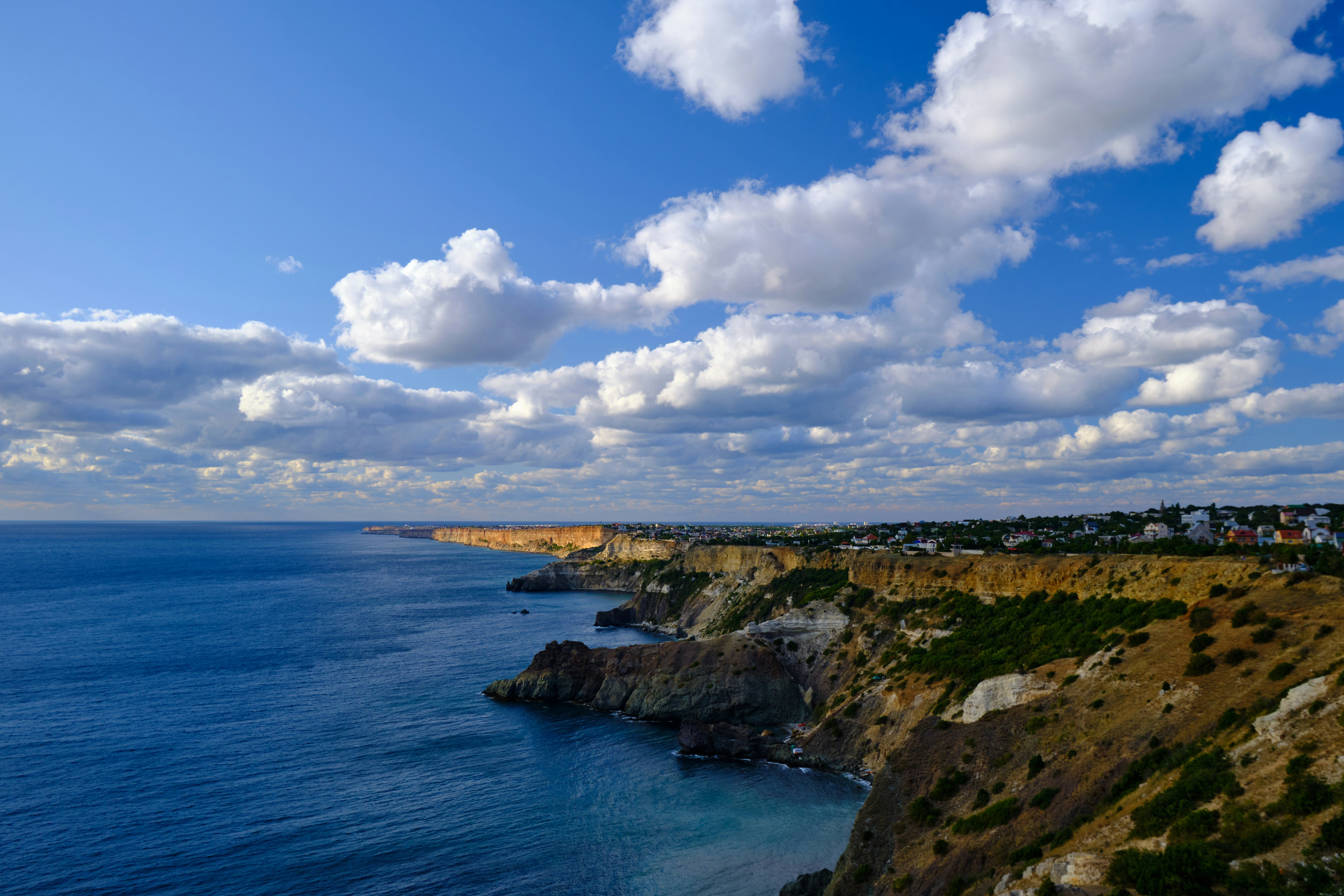 a view of the ocean from a cliff