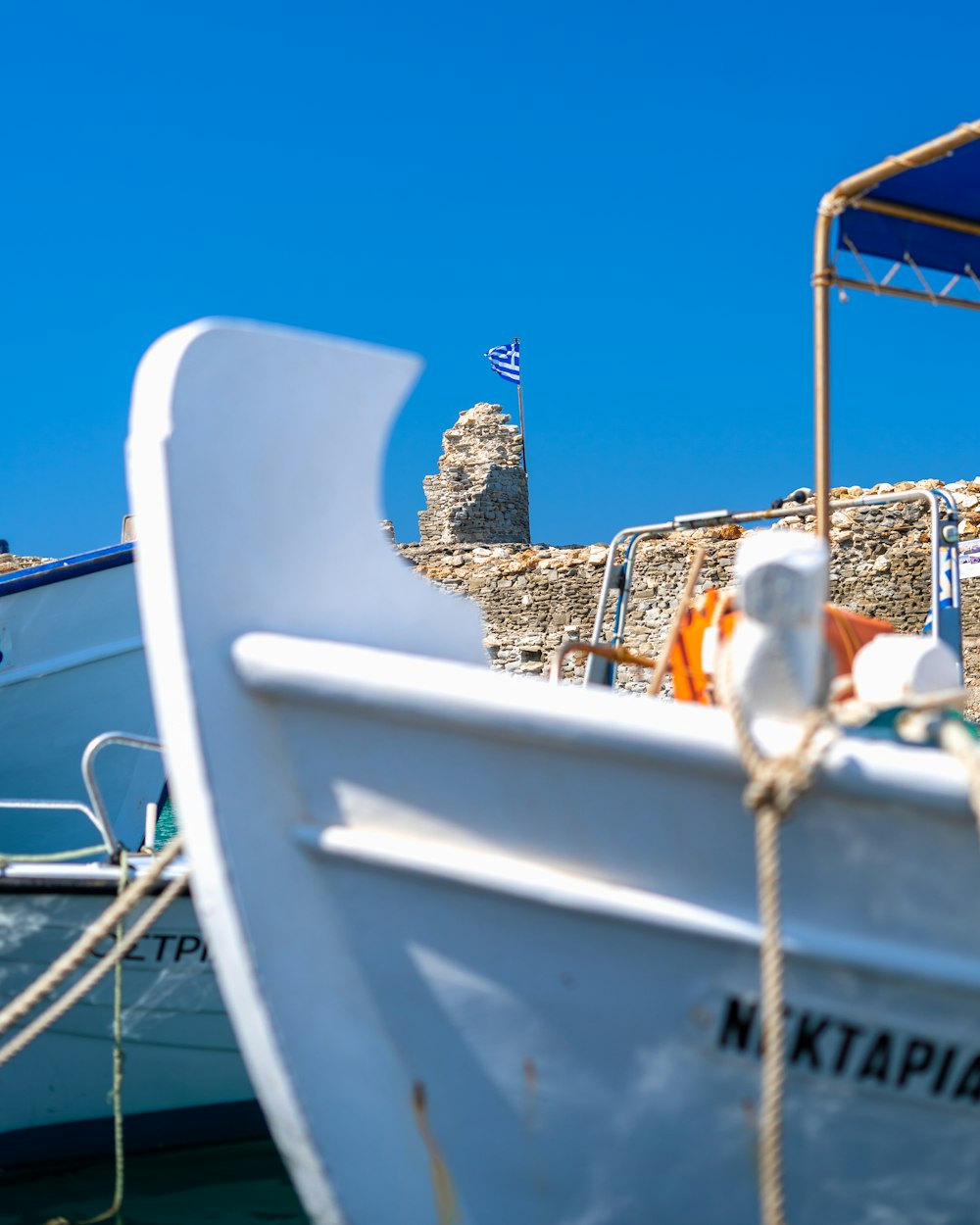 a couple of boats that are sitting in the water