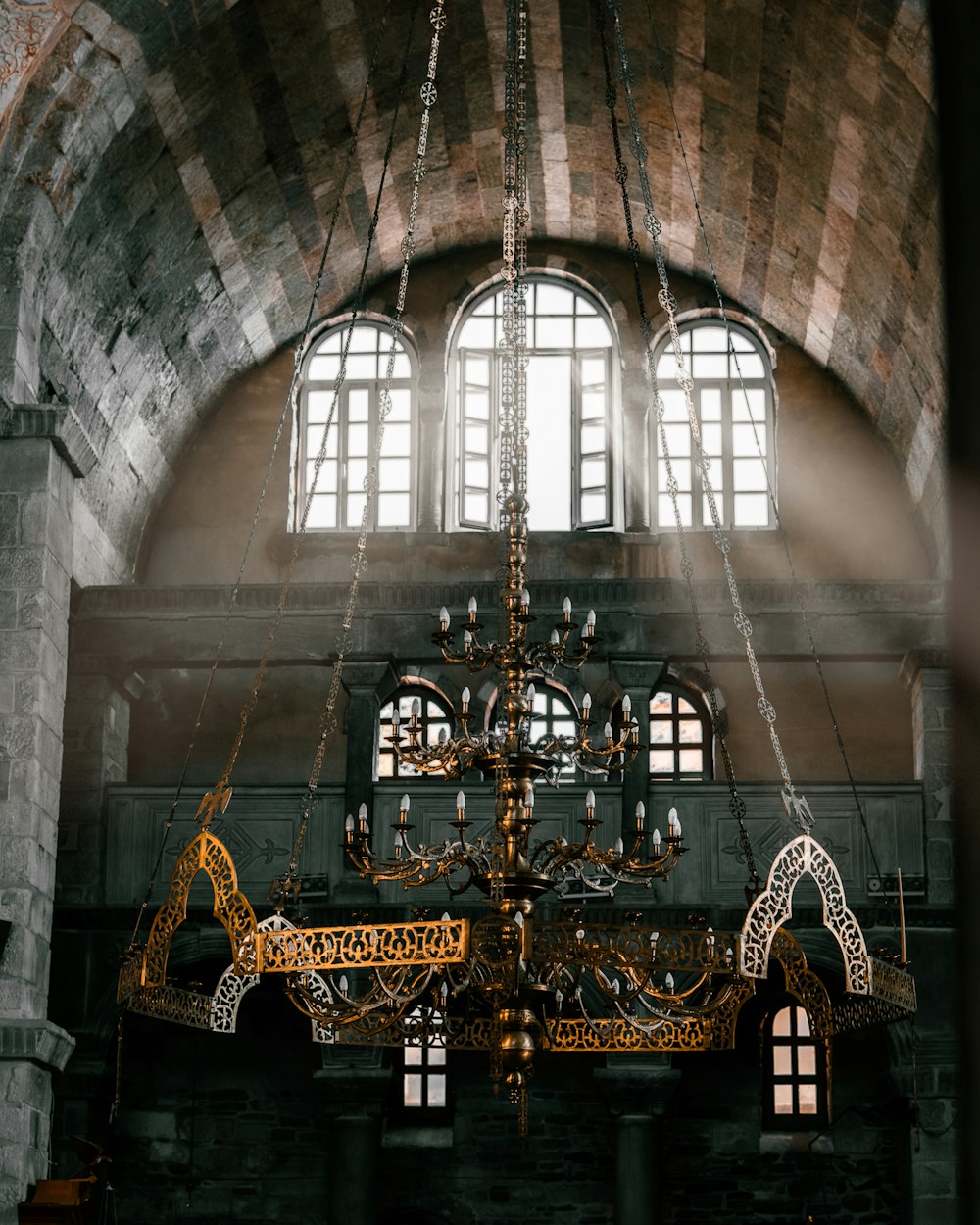 a chandelier hanging from the ceiling of a building