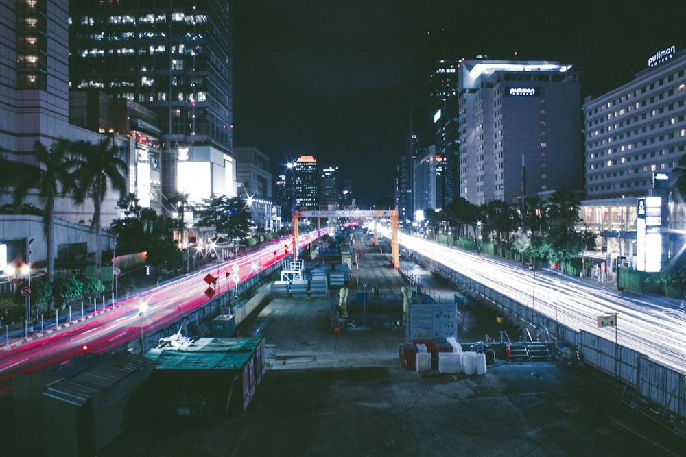 a city street at night with a lot of traffic