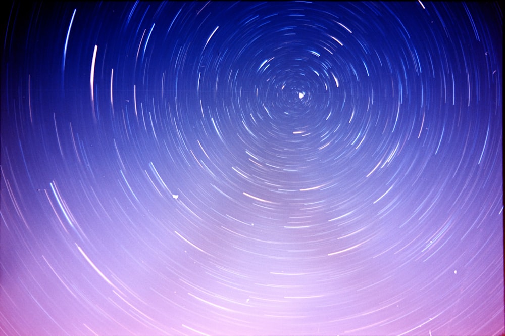 a star trail is seen in the sky