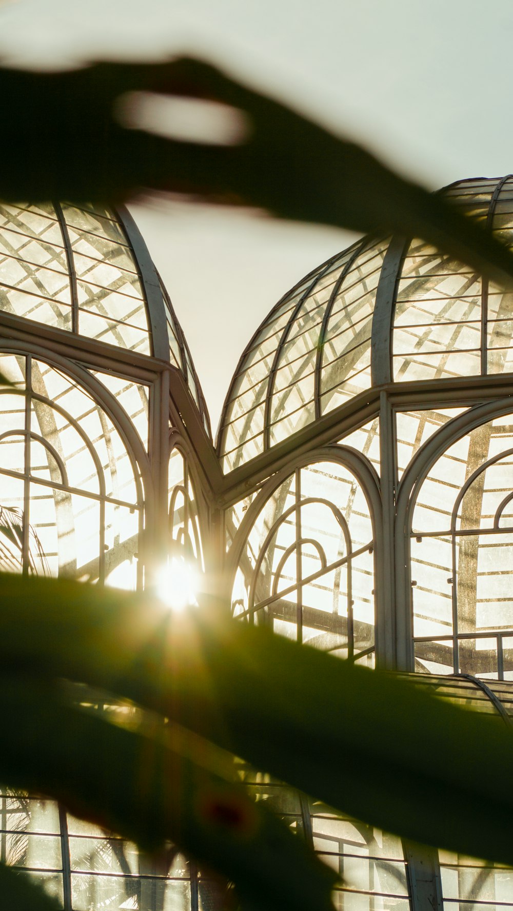 the sun is shining through the windows of a building