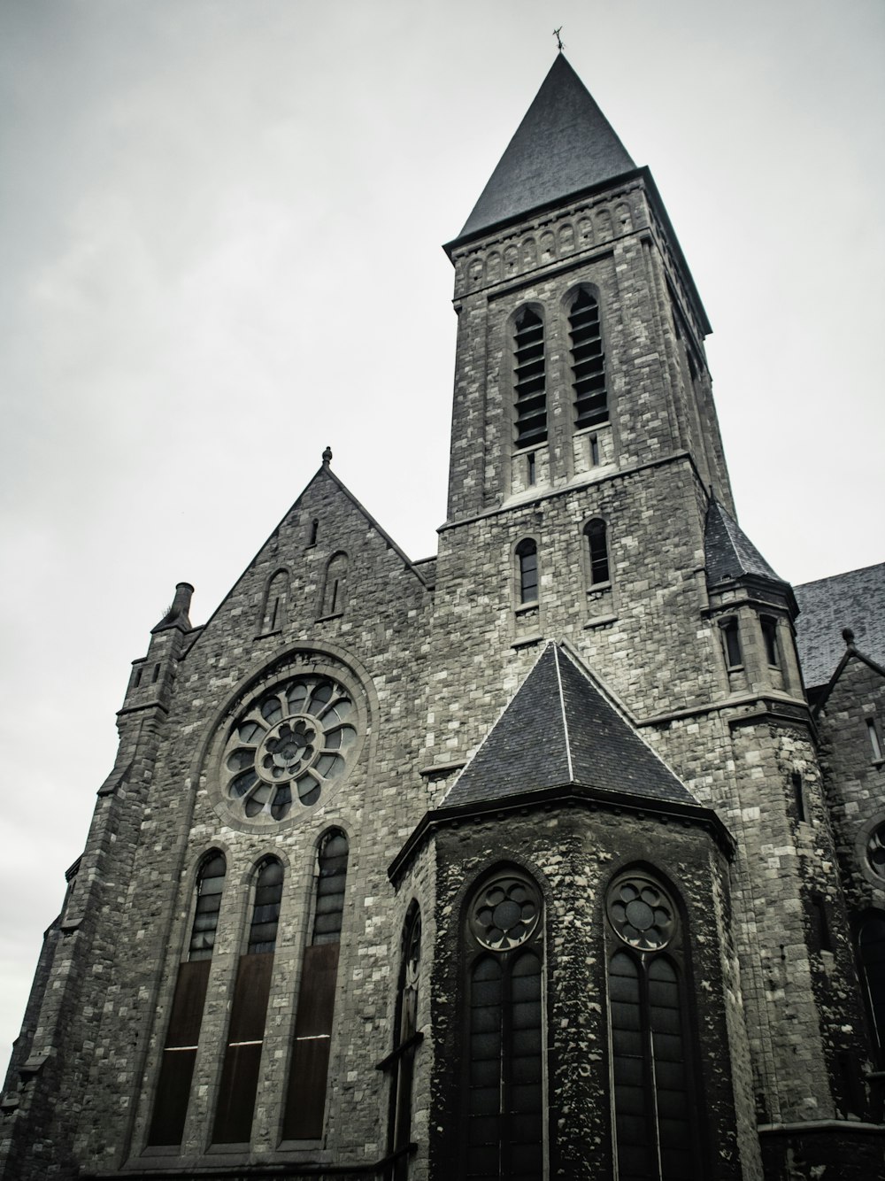 a large church with a clock on the front of it