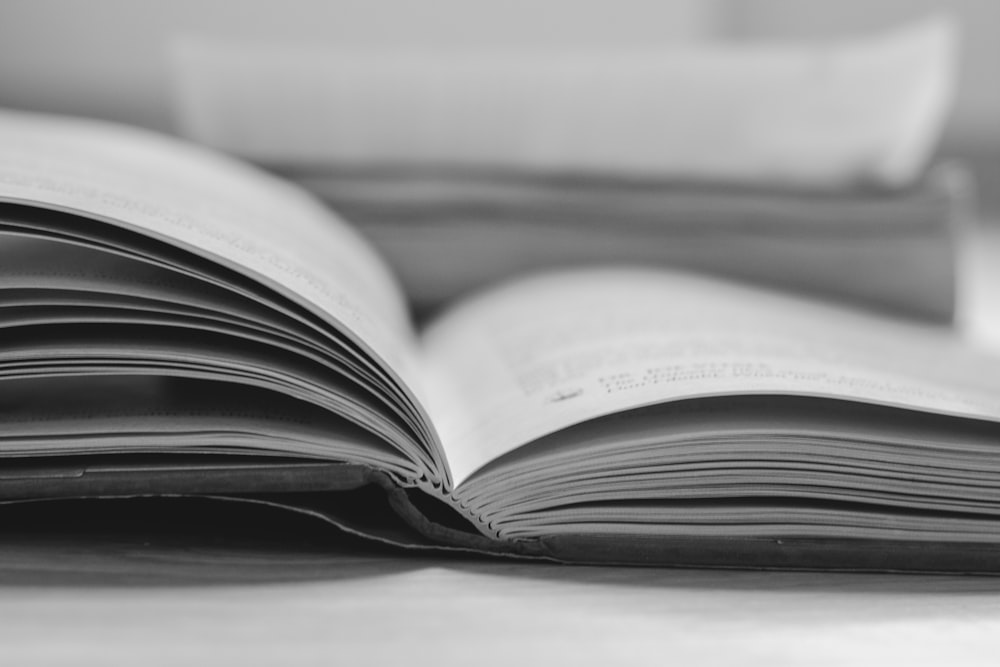 an open book sitting on top of a table