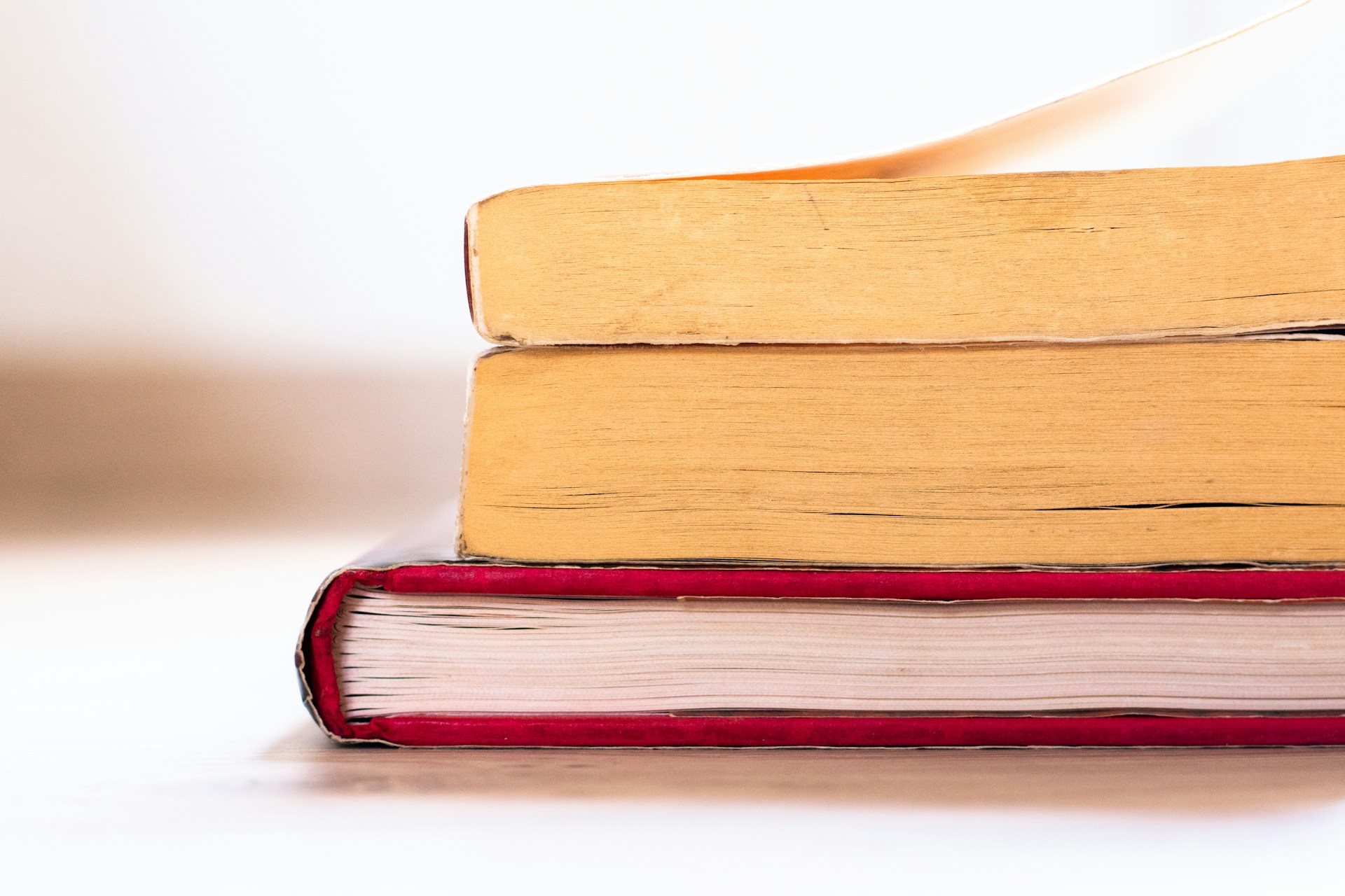 a stack of books sitting on top of each other