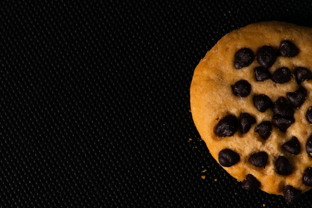 a cookie with chocolate chips on top of it