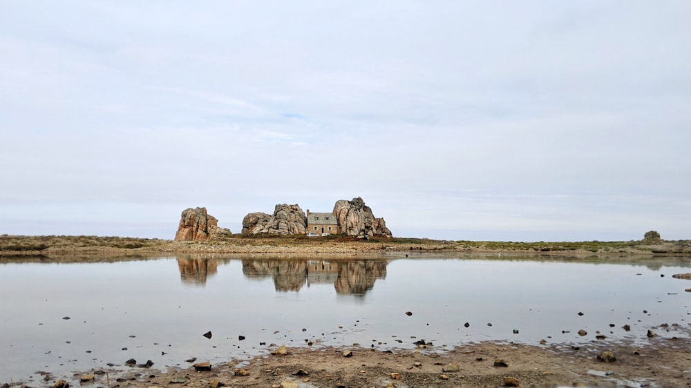 a large body of water surrounded by rocks