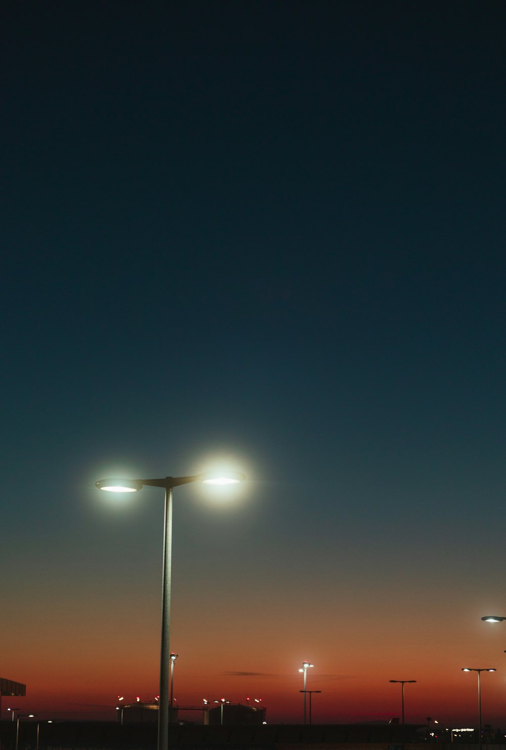 a couple of street lights sitting next to each other