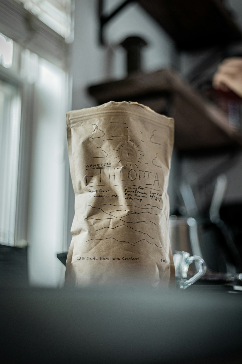 a brown paper bag sitting on top of a table