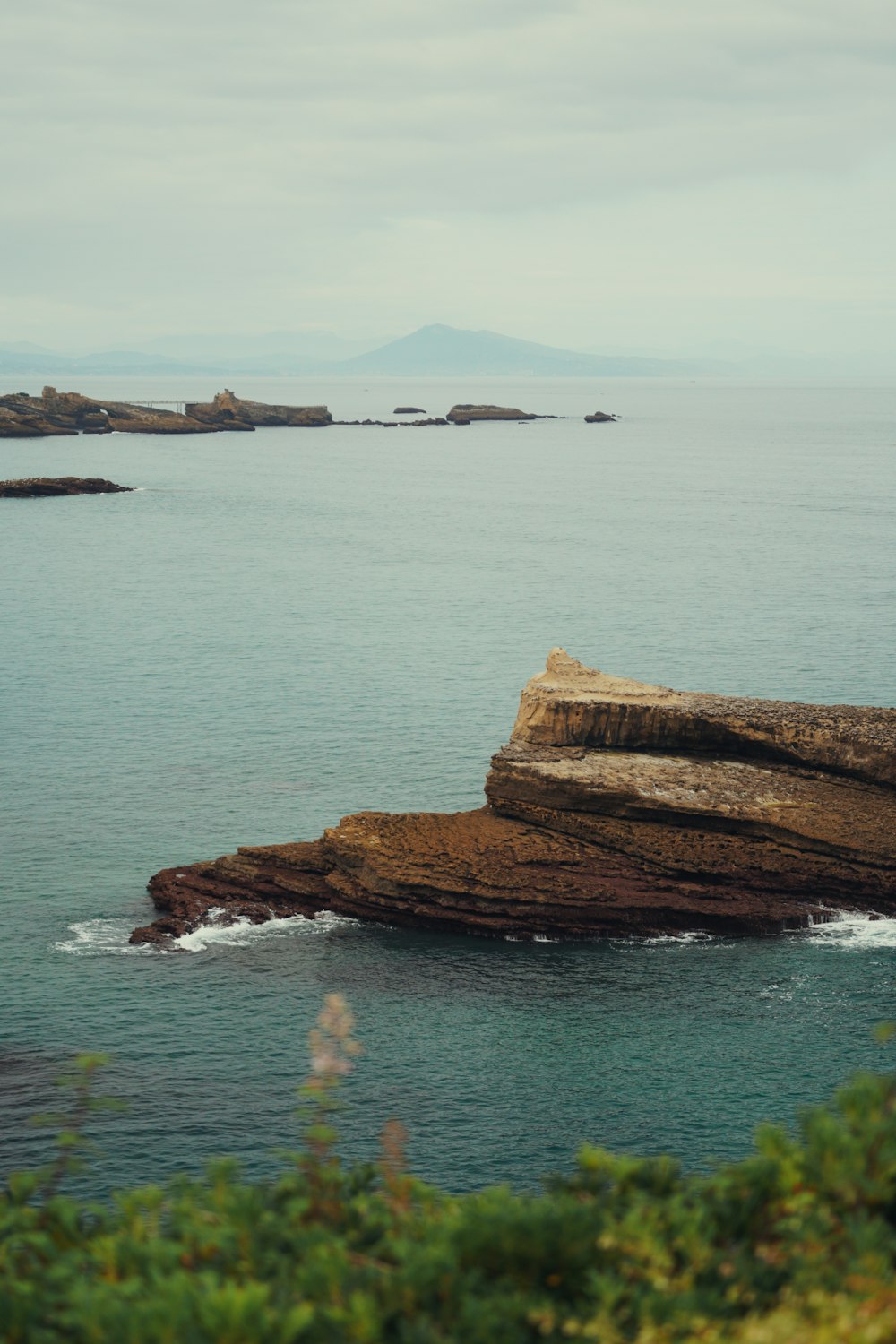 a large body of water surrounded by rocks