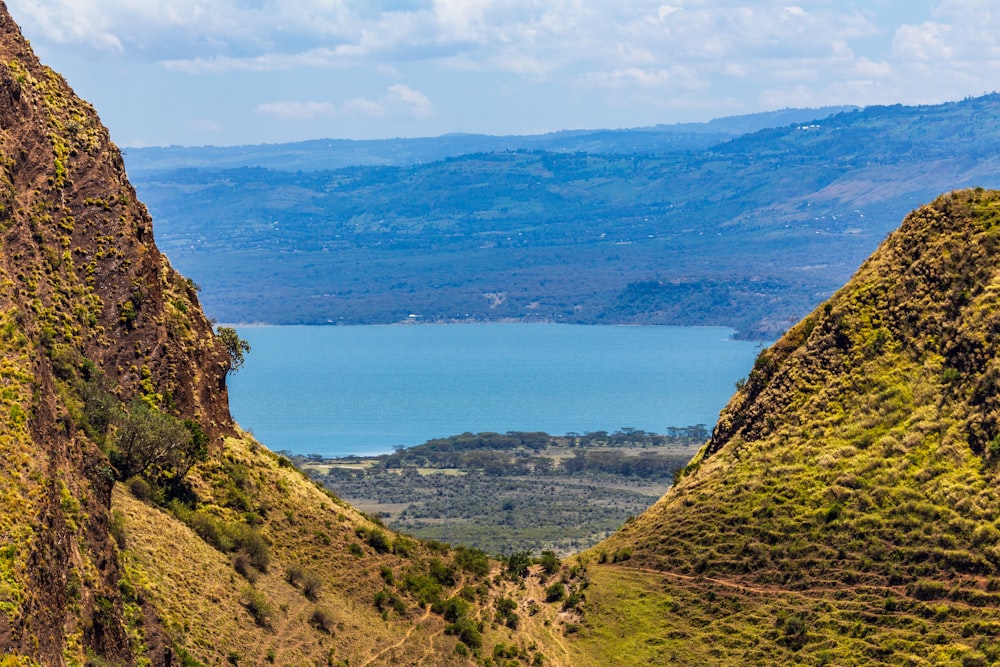 a scenic view of a lake and mountains