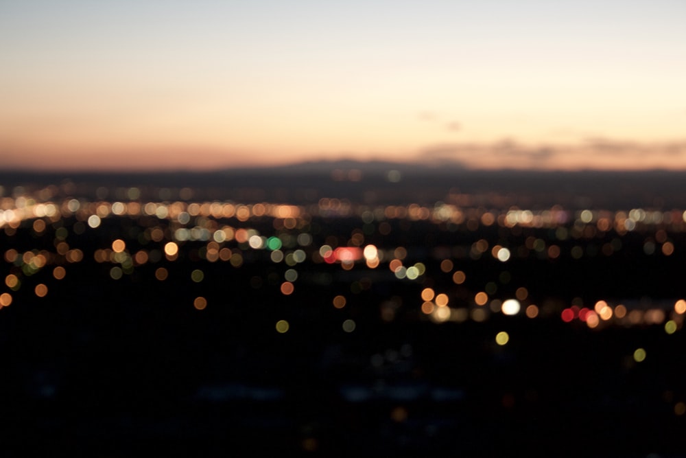 a blurry photo of a city at night