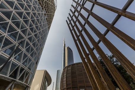 a couple of tall buildings next to each other