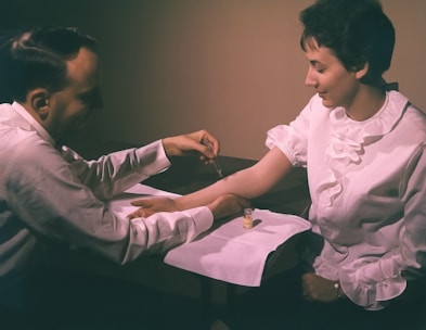 a man and a woman sitting at a table