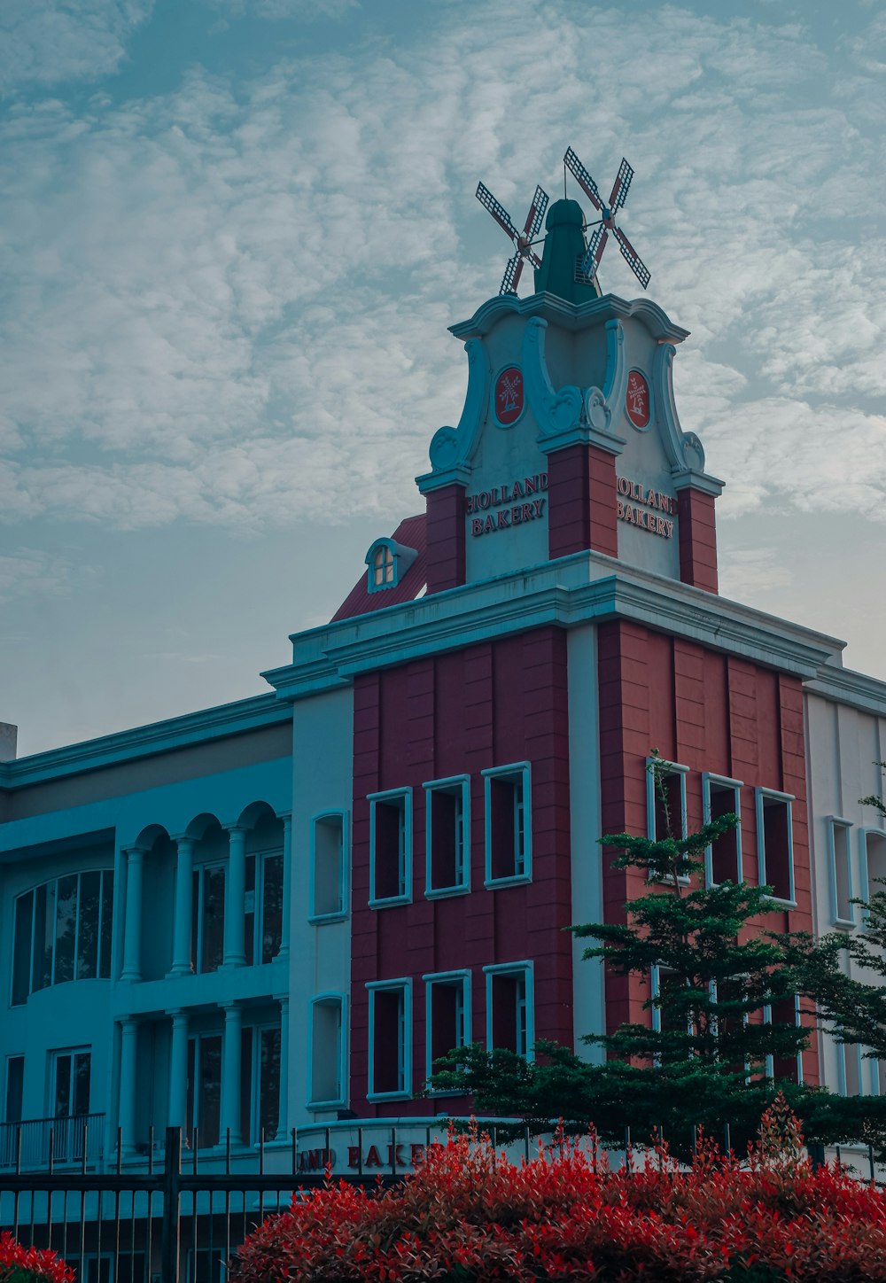 a tall building with a clock on the top of it