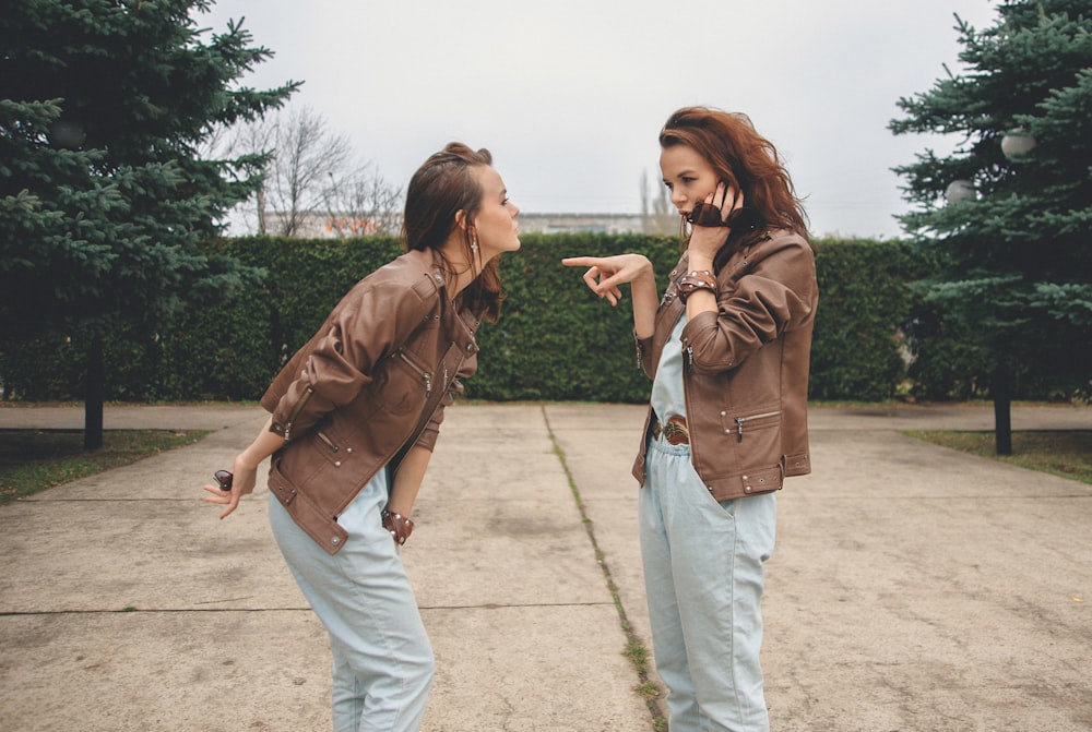 two young women standing next to each other