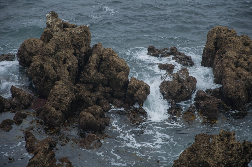 a large body of water surrounded by rocks