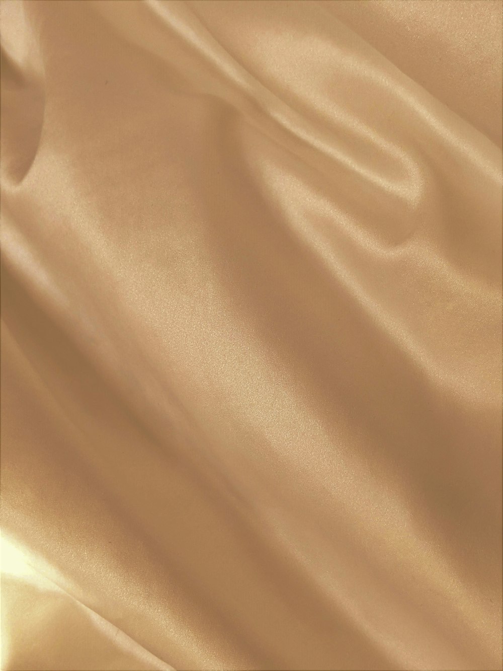 a close up view of a beige fabric