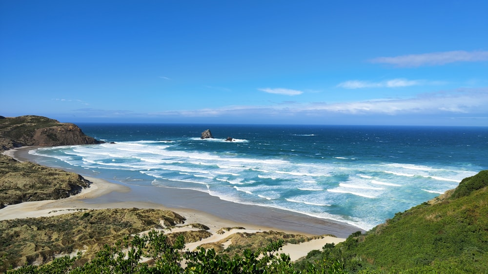 a view of a beach with a boat in the water