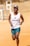 A happy runner wearing Flvrun gear during a training session.