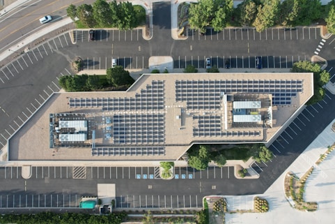 an aerial view of a parking lot and a parking lot