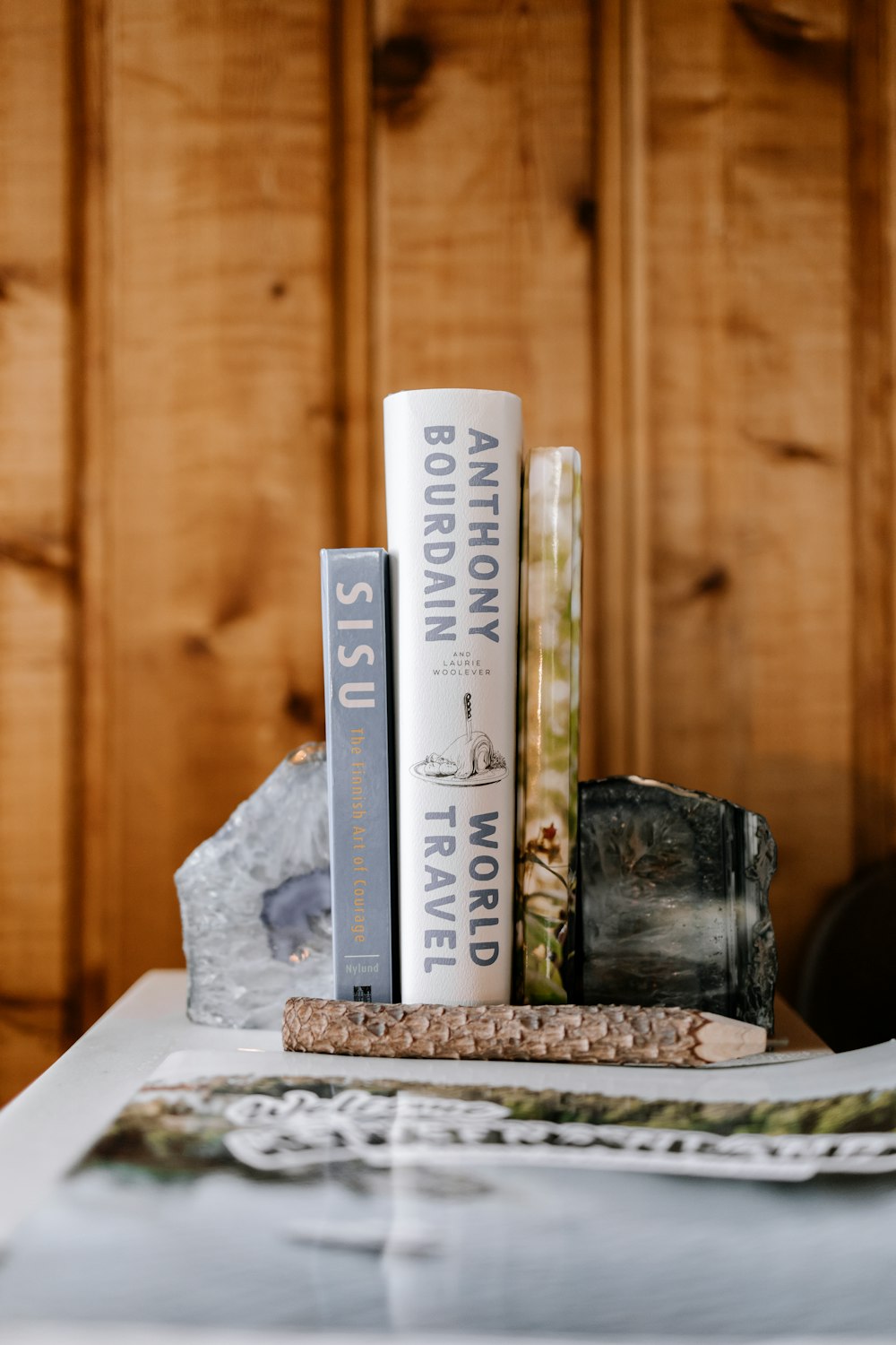 a stack of books sitting on top of a table