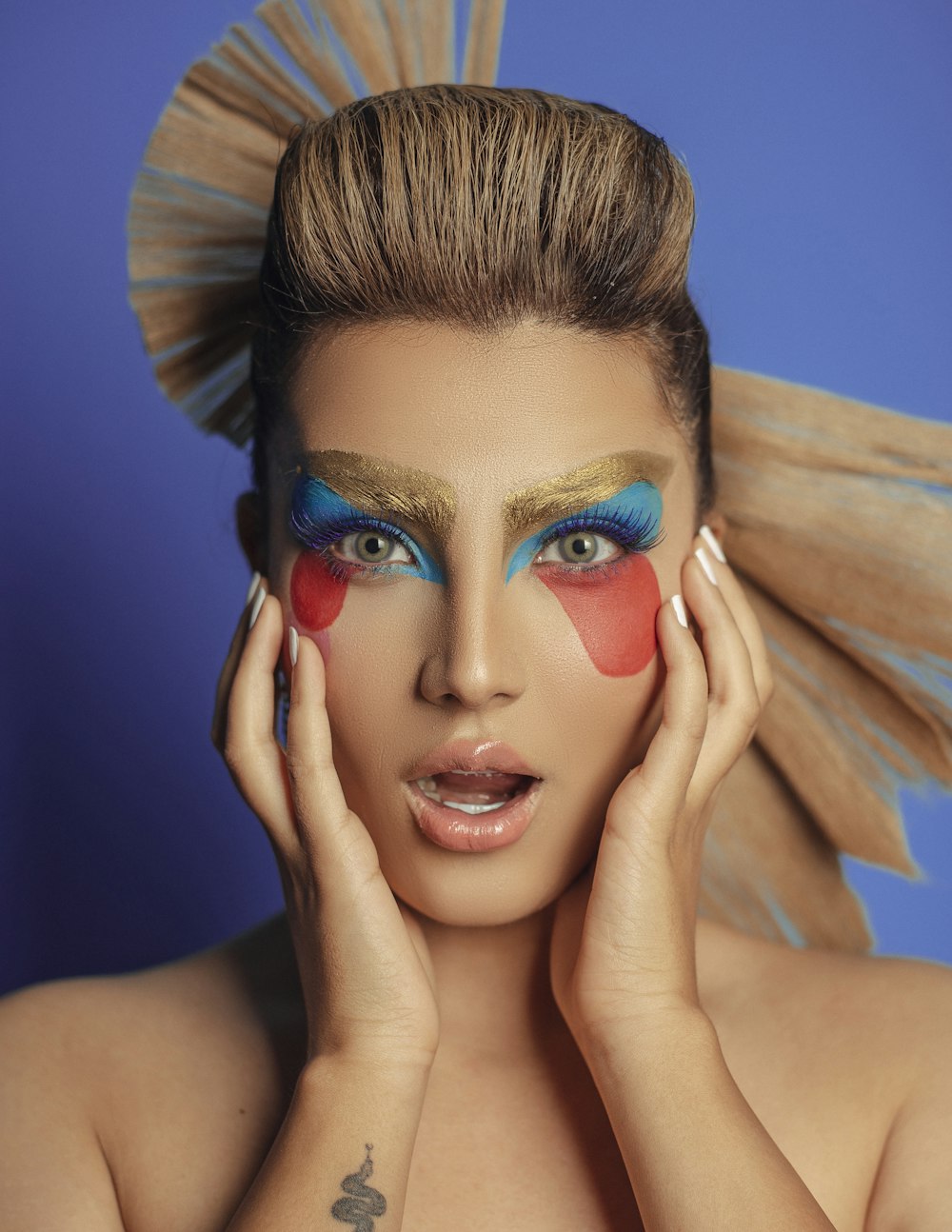a woman with a colorful make - up on her face