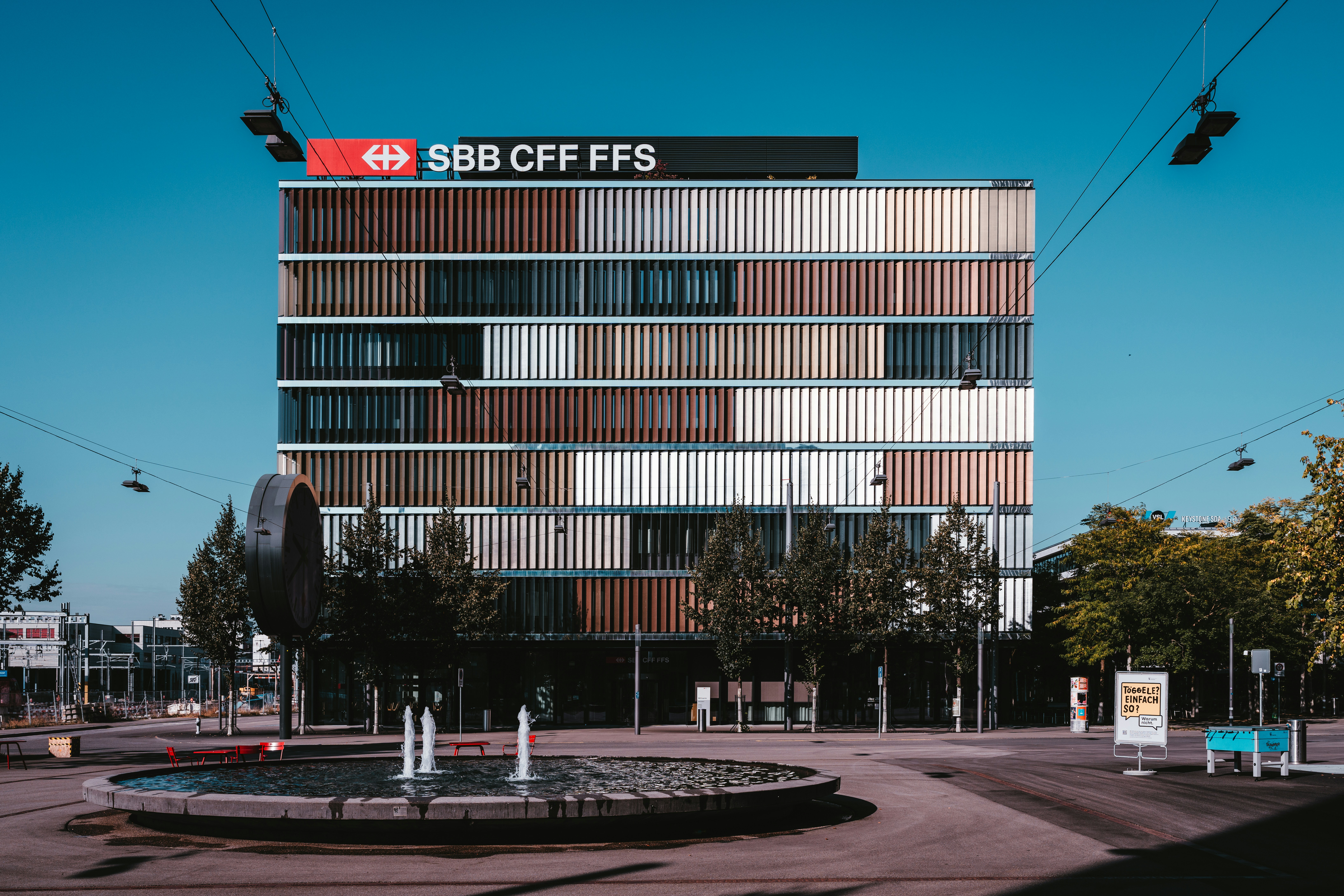a building with a fountain in front of it