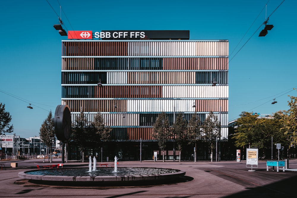 a building with a fountain in front of it