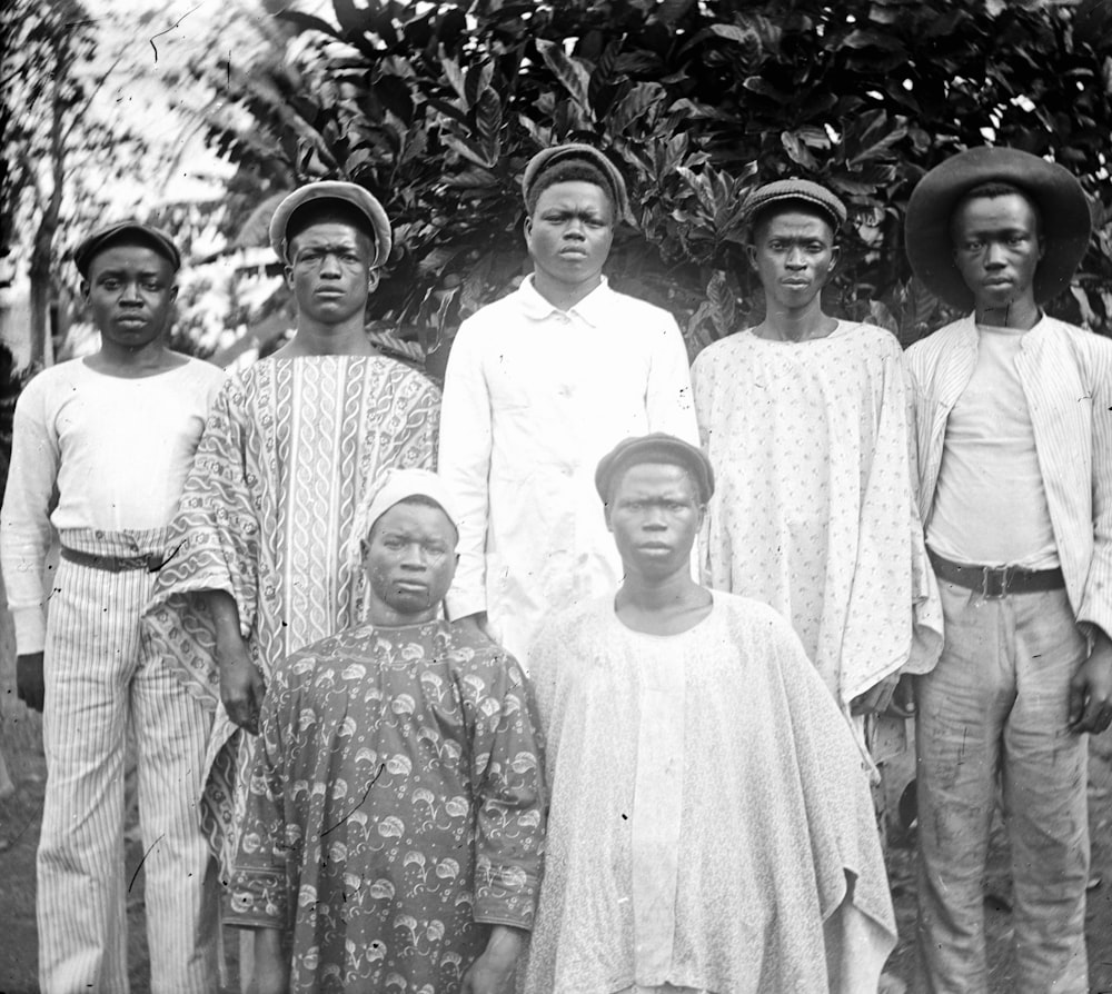 a group of people standing next to each other