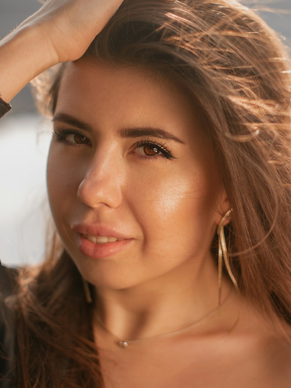 a close up of a person with long hair