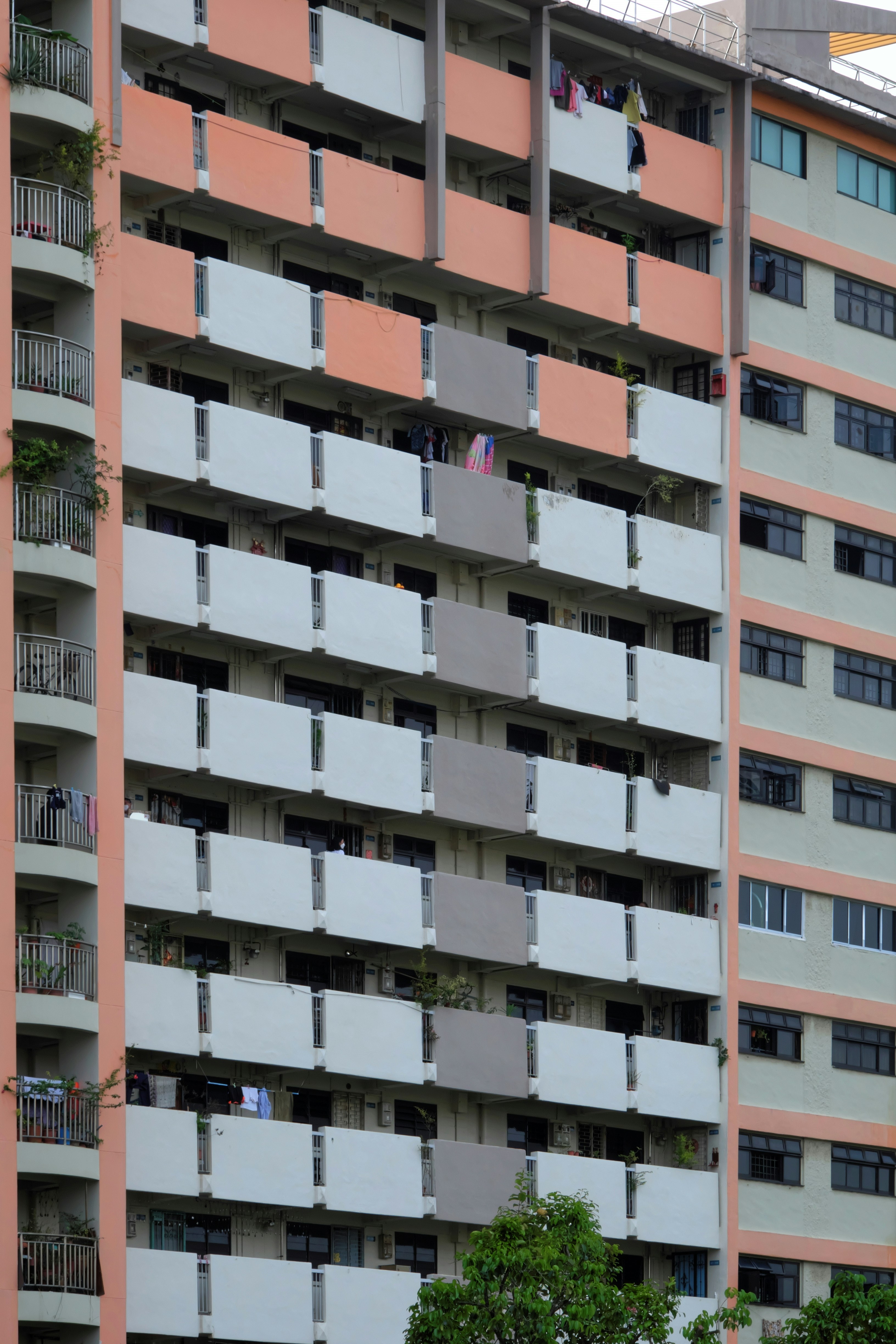 a tall building with balconies and balconies on the balconies