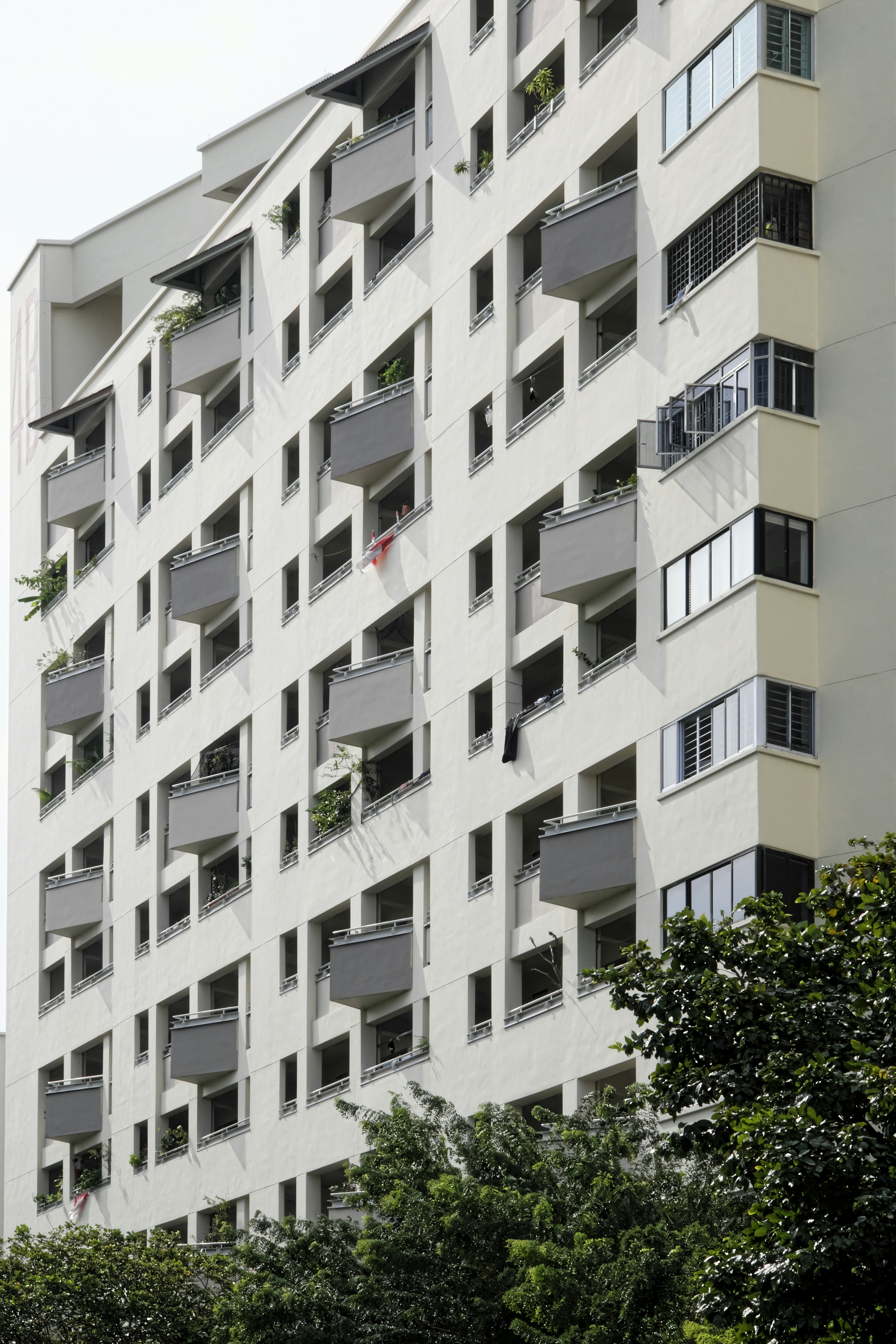a tall building with balconies and balconies on the balconies