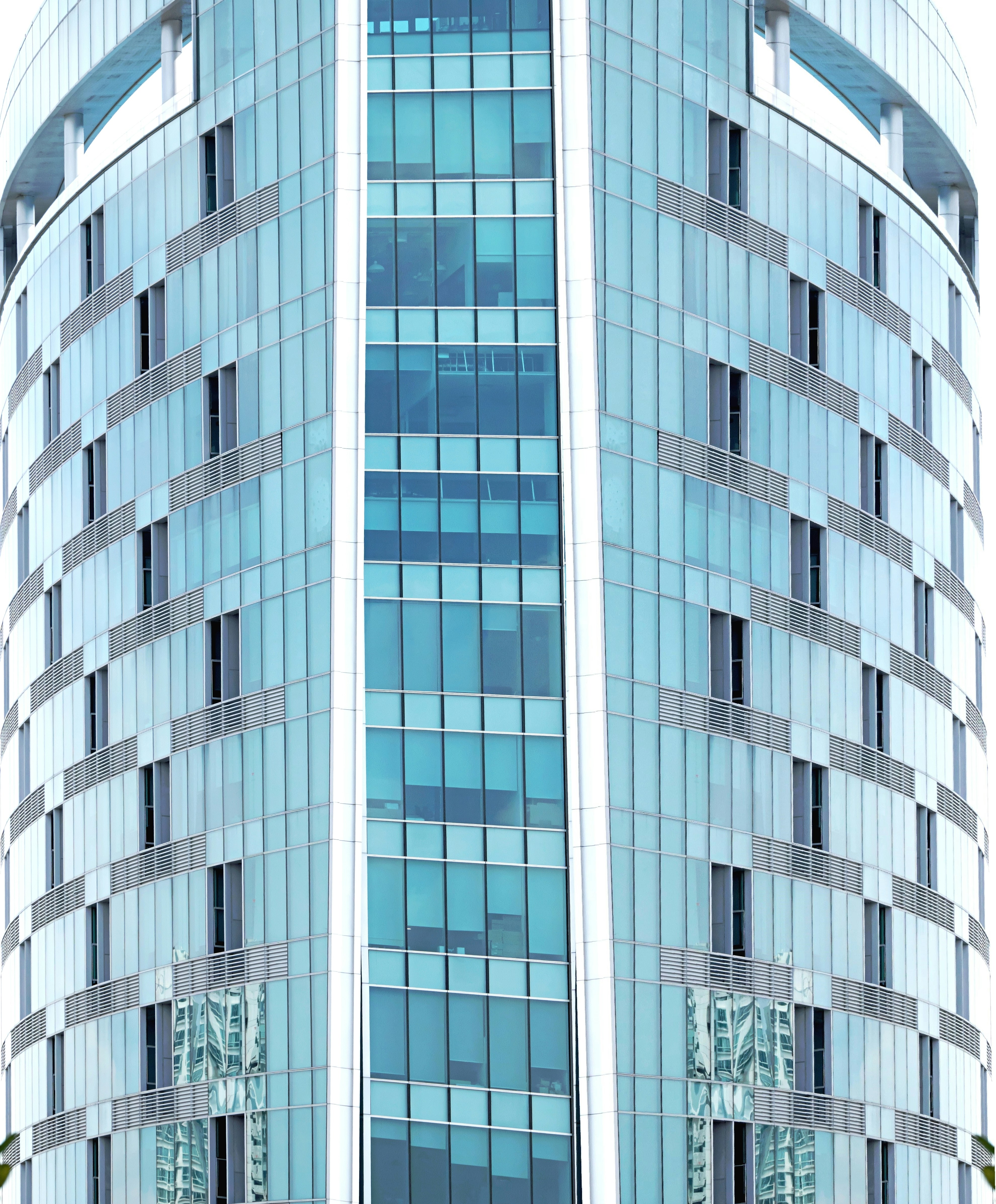 a very tall building with a clock on it's side