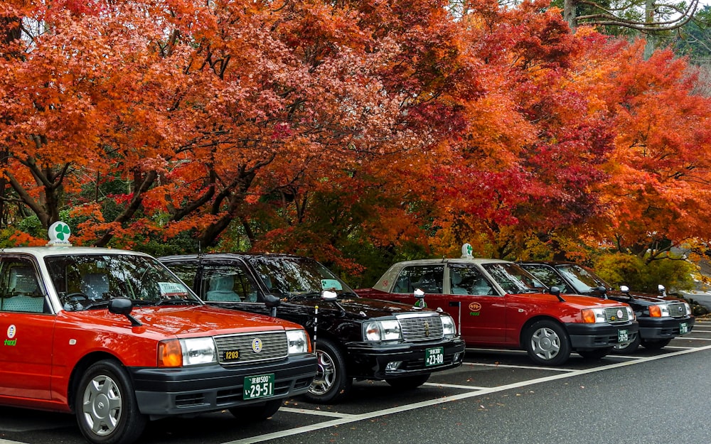 a row of parked cars in a parking lot