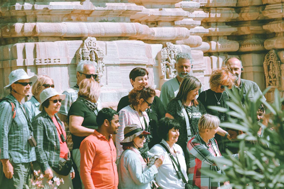 a group of people standing next to each other