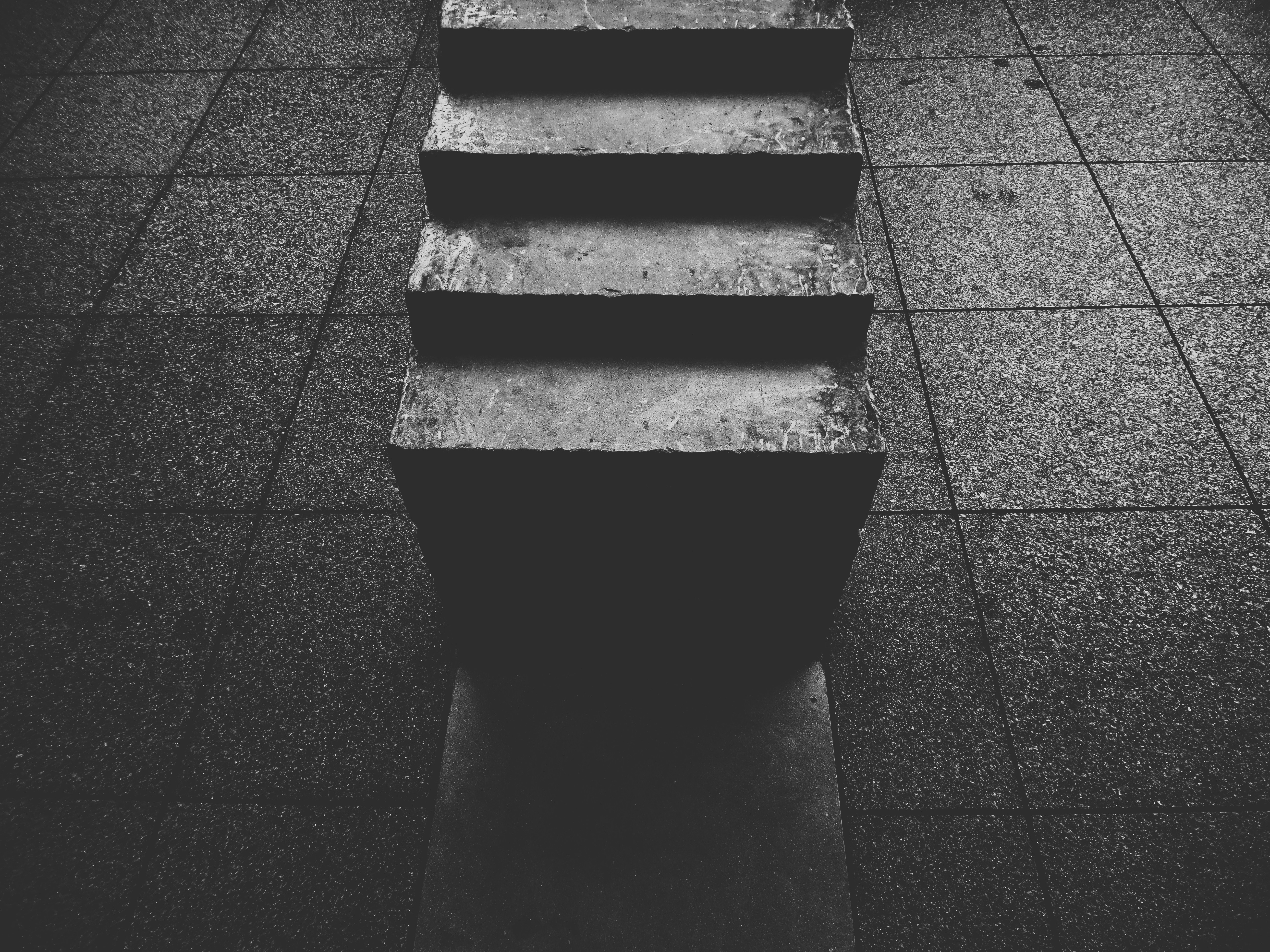 a black and white photo of a set of stairs
