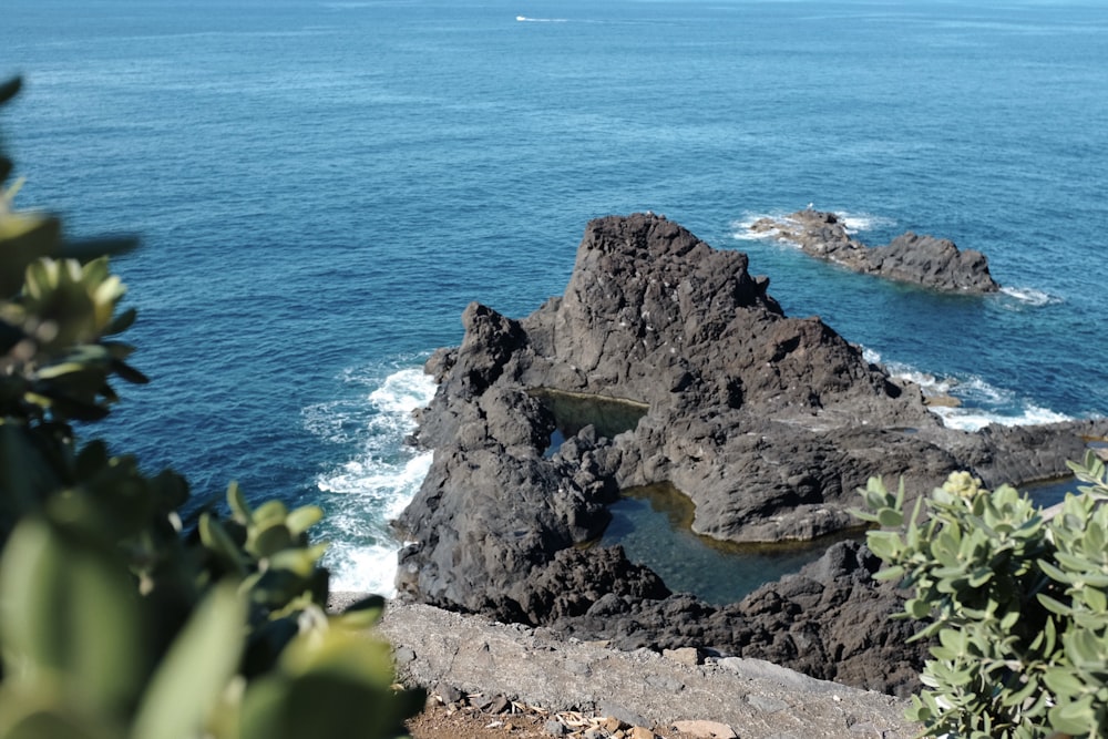 a view of a body of water from a cliff