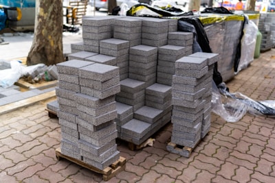 Stacks of various building materials ready for delivery at Ahamm Construction.