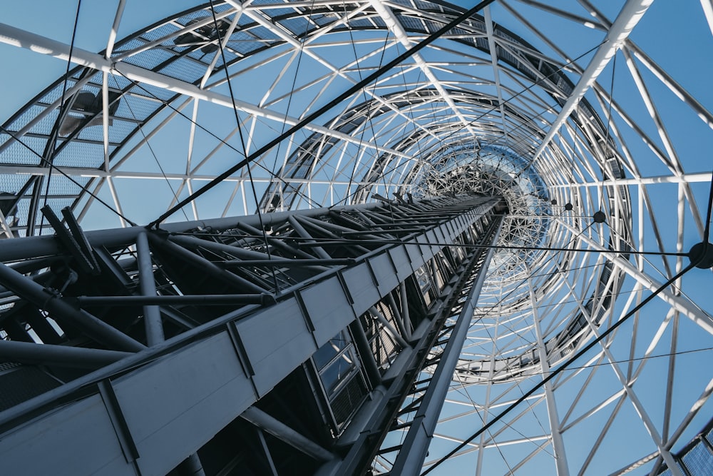 a very tall metal structure with a sky background