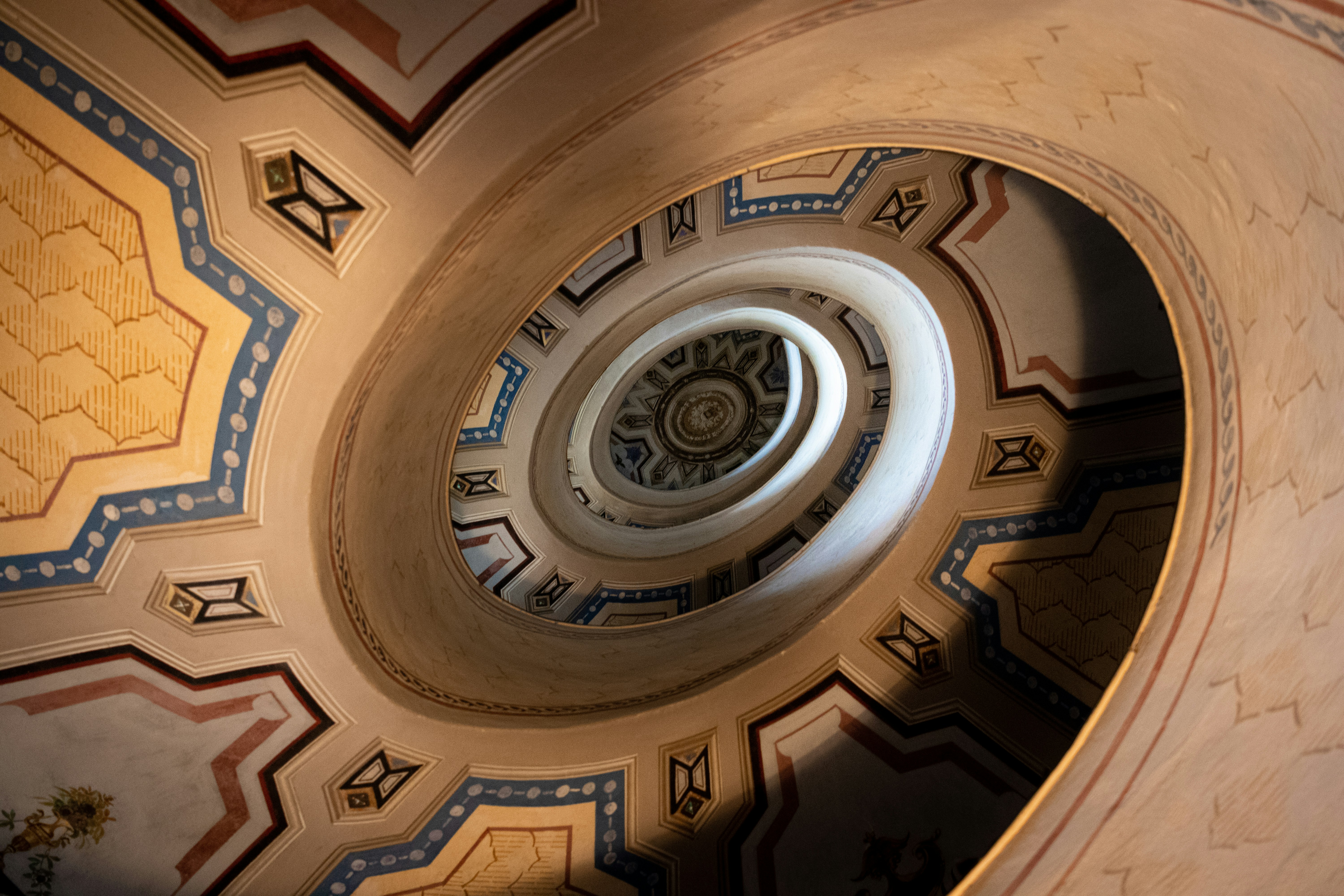 a view of a spiral staircase in a building