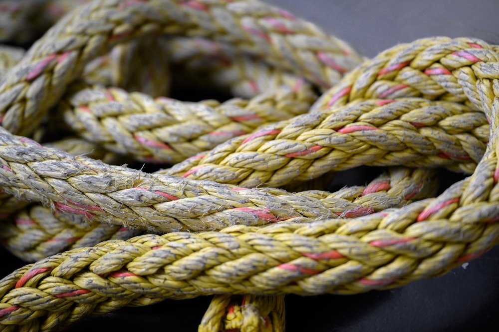 a close up of a rope on a black surface