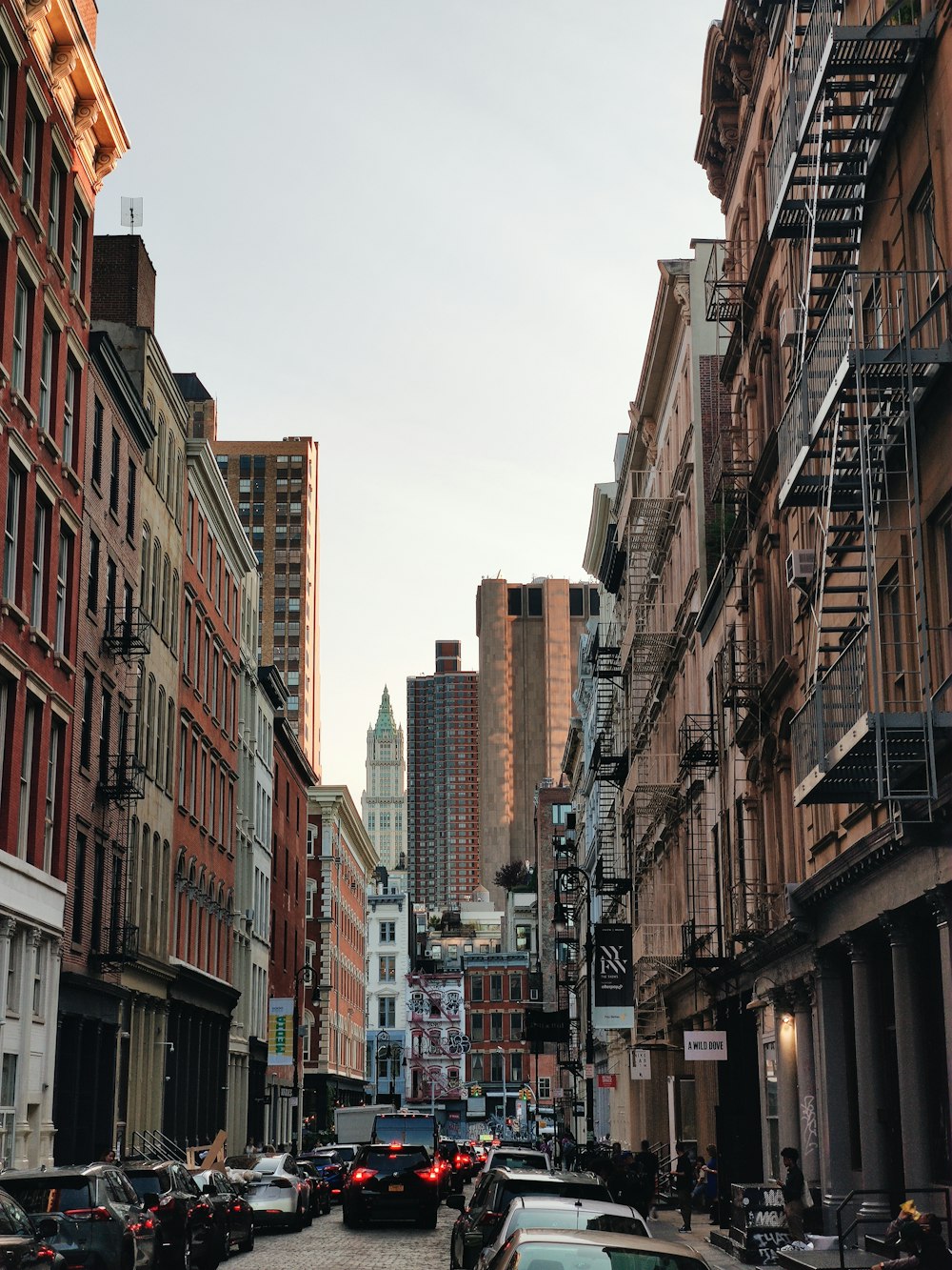 a city street filled with lots of tall buildings