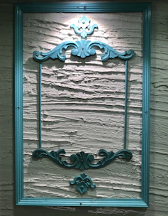 Elegant wooden picture frame featuring a delicate laser-etched design.