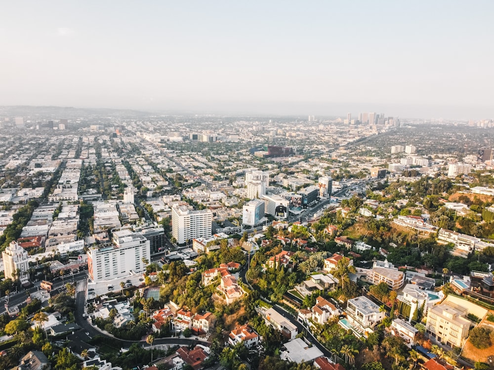 an aerial view of a city with tall buildings