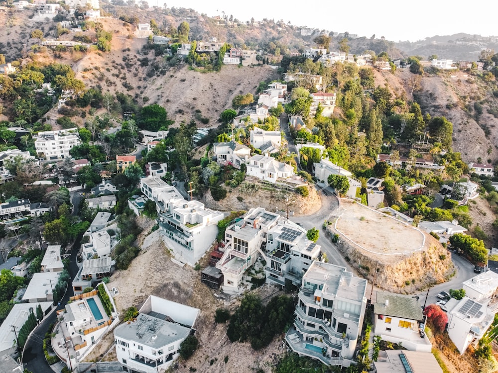 an aerial view of a residential area in the hills