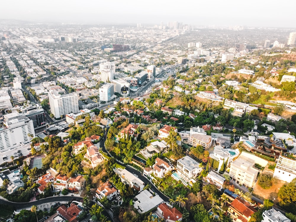 an aerial view of a city with lots of buildings