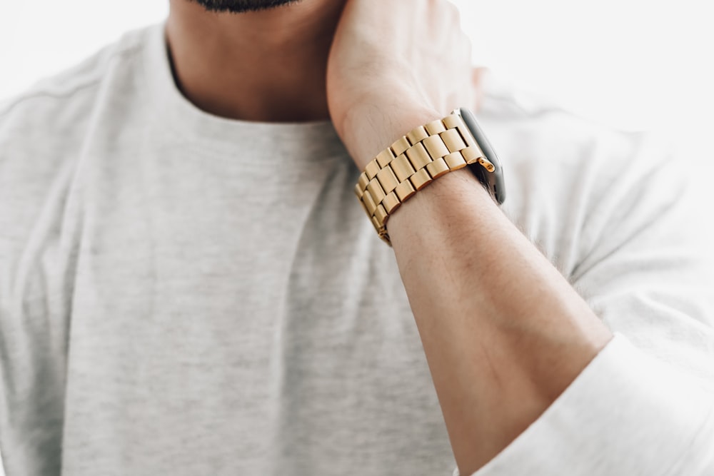 a man with a watch on his wrist