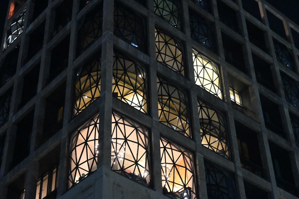 a very tall building lit up at night